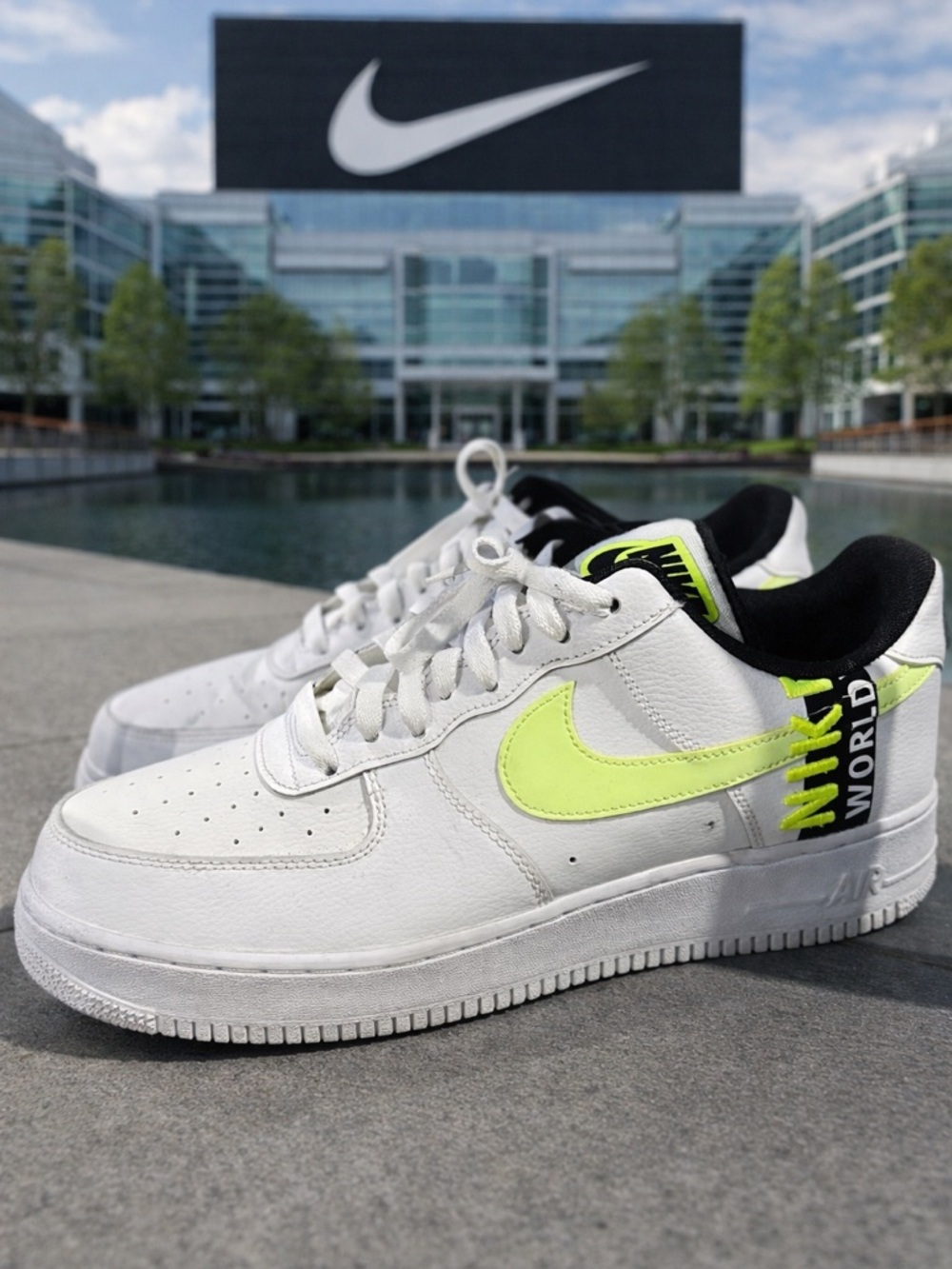 Nike AF 1’s white sneaker label with black and green logo